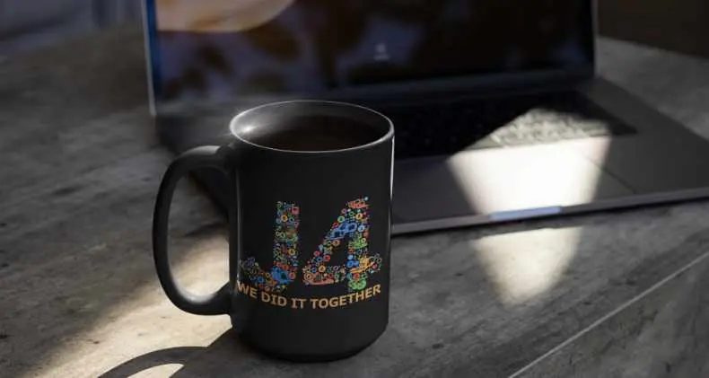 Coffee in a joomla mug while using the computer